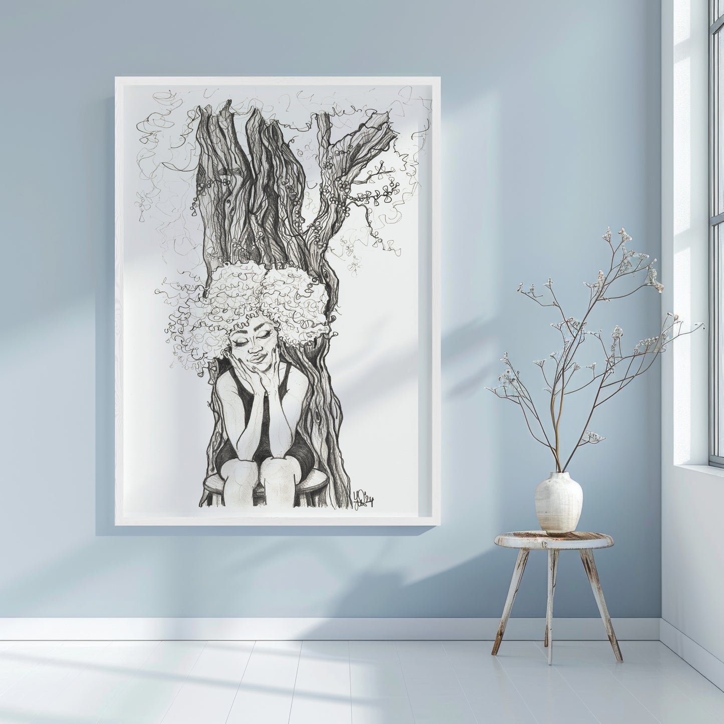 Framed artwork of a woman in Burundi sitting under a fig tree in a minimalistic room with a vase on a small table. A piece on our home, Mother Nature